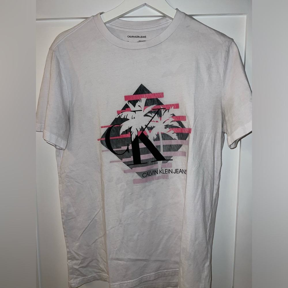 Calvin Klein men’s medium, white t shirt with pink and black logo. Barely worn.